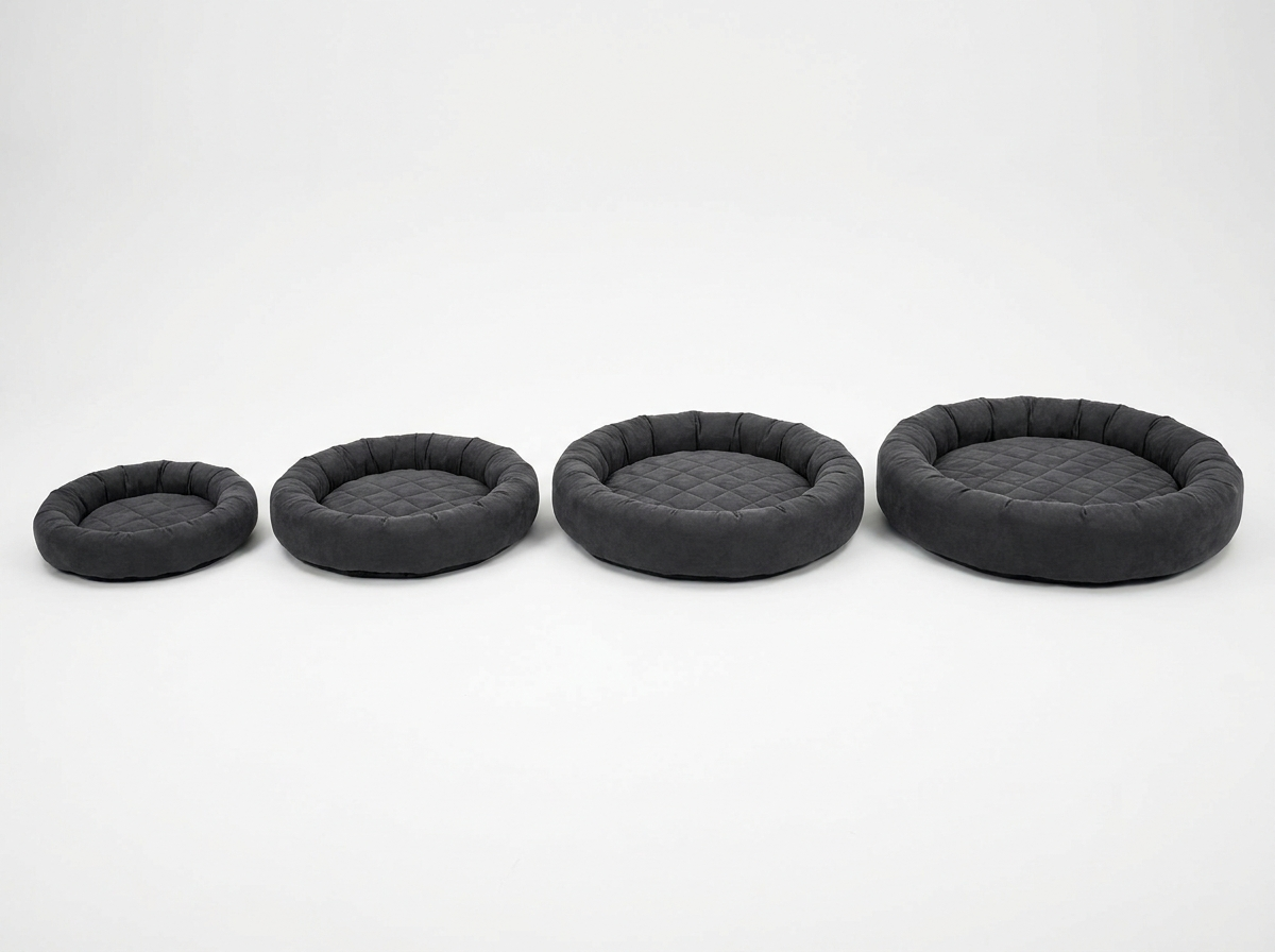Cloud Rest orthopedic memory foam pet bed in dark grey shown in four sizes side by side, Medium to XXL, illustrating the size range